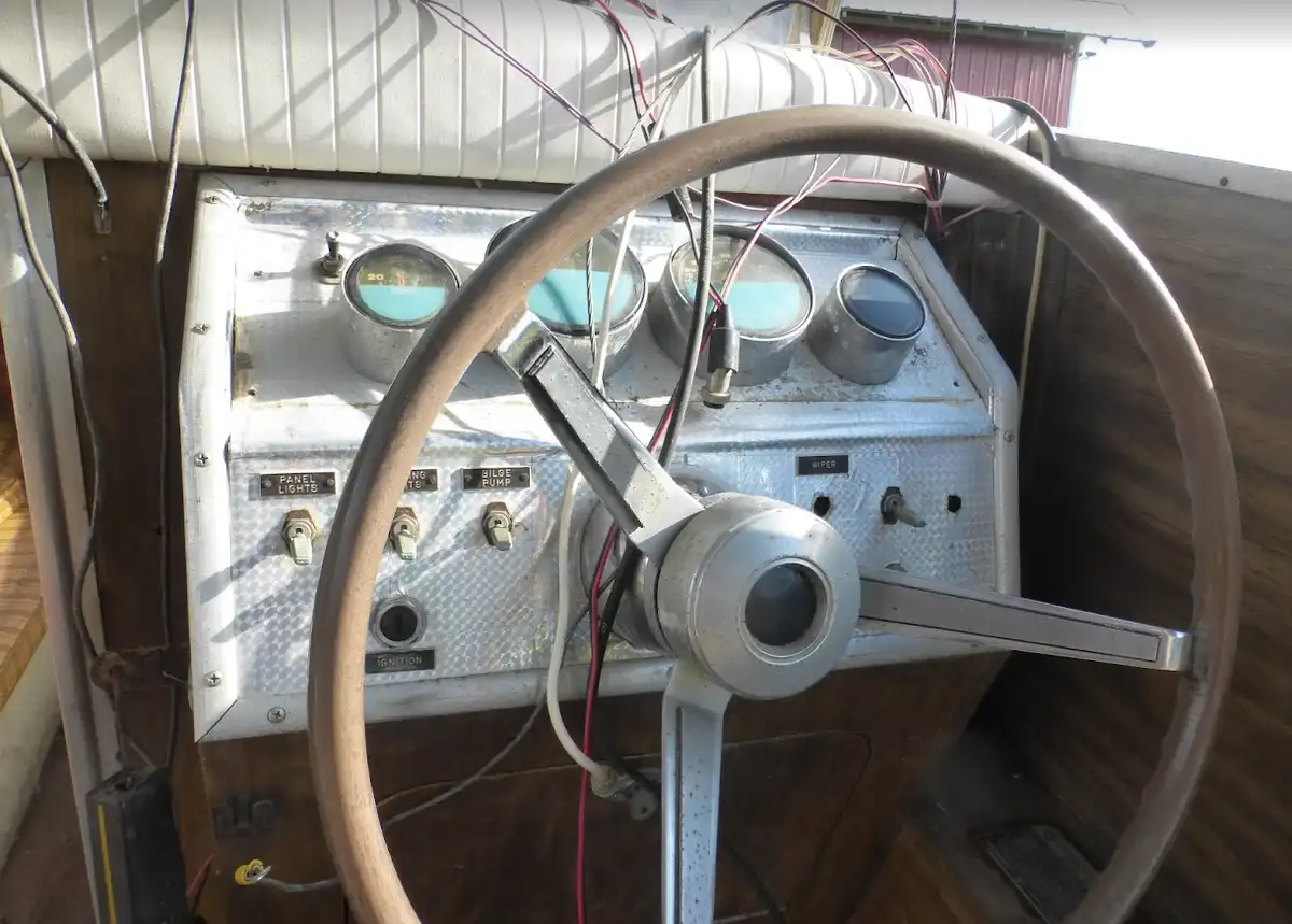 Relocating the helm on a tin boat for better navigation.