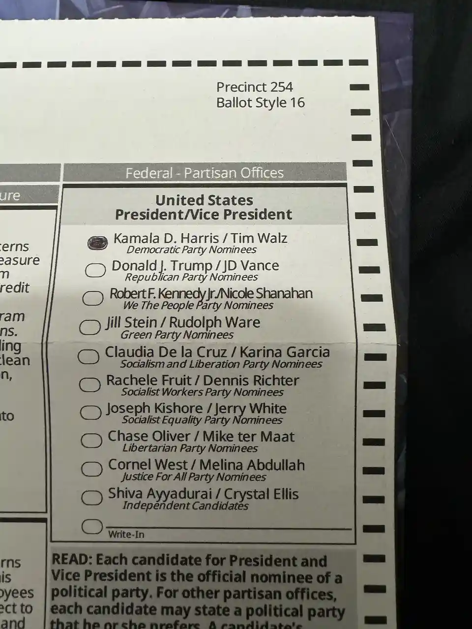 A close-up photo of a U.S. presidential ballot from Precinct 254, Ballot Style 16, showing the 'United States President/Vice…