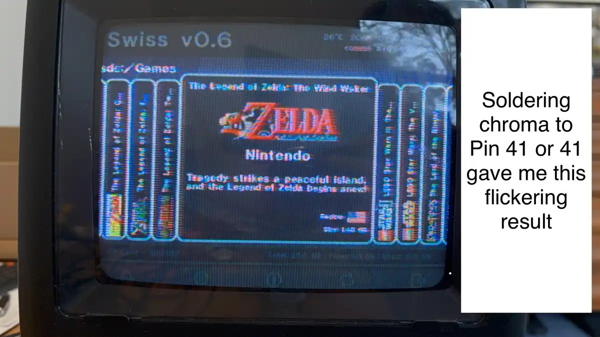 A close-up of a small screen displaying the 'The Legend of Zelda: The Wand Maker' game title screen from a 'Swiss v0.6' game…