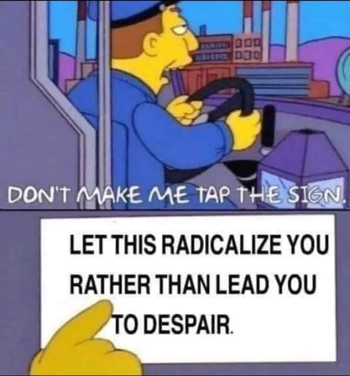 A cartoon image shows a yellow-skinned man in a blue uniform driving a vehicle, looking annoyed. Text overlaid on the image…